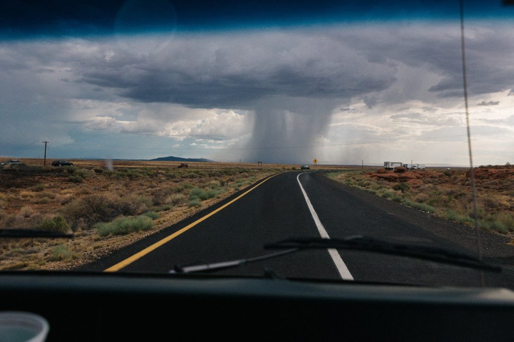 A tornado hitting a highway road