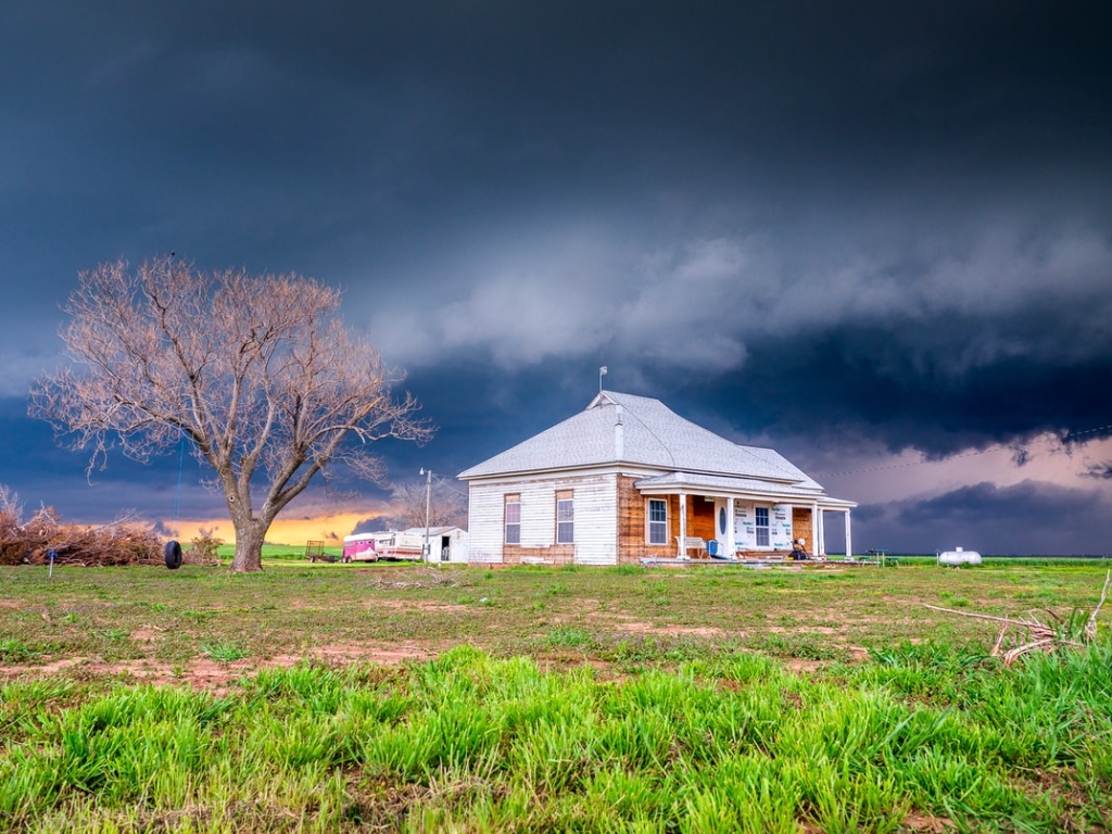 Dark clouds over a house
