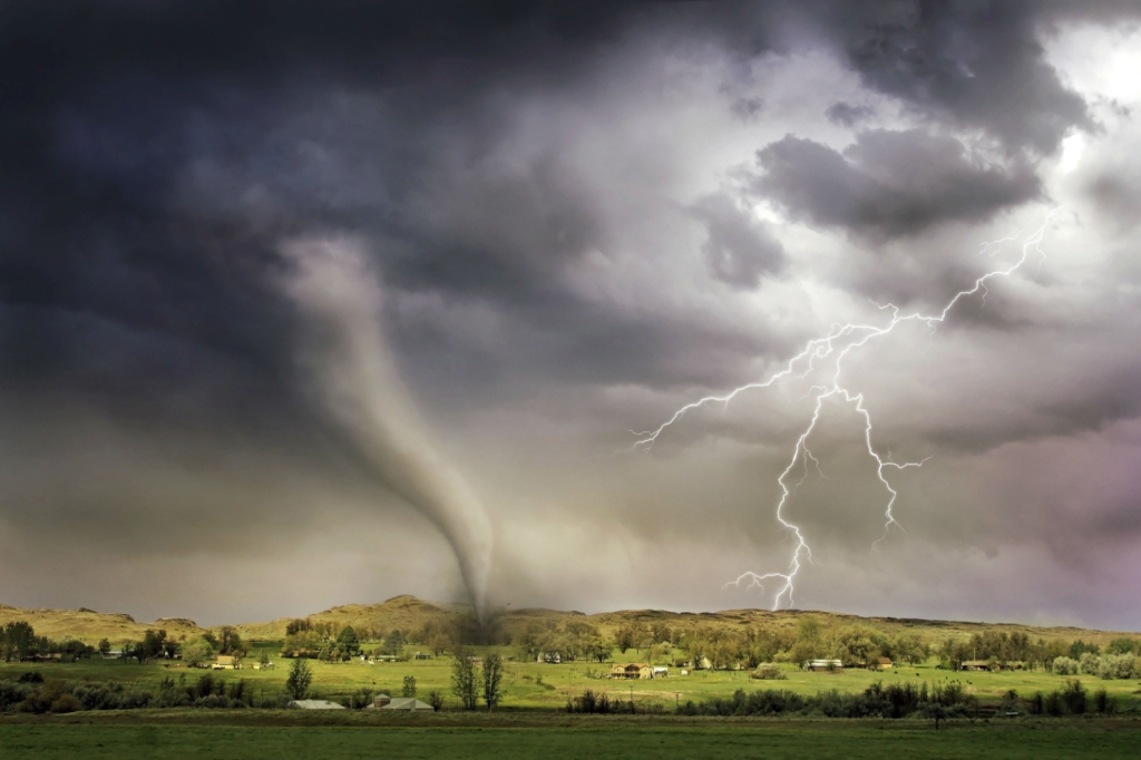 Tornado and lighting hitting a village