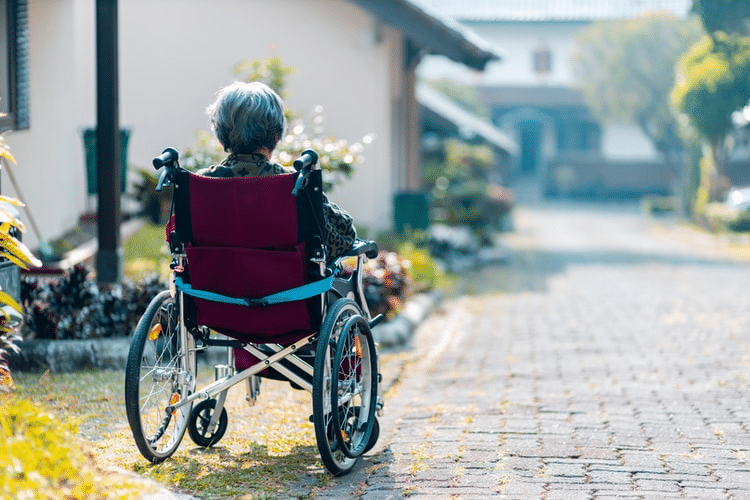 Handicapped Woman woman sitting on a wheelchair
