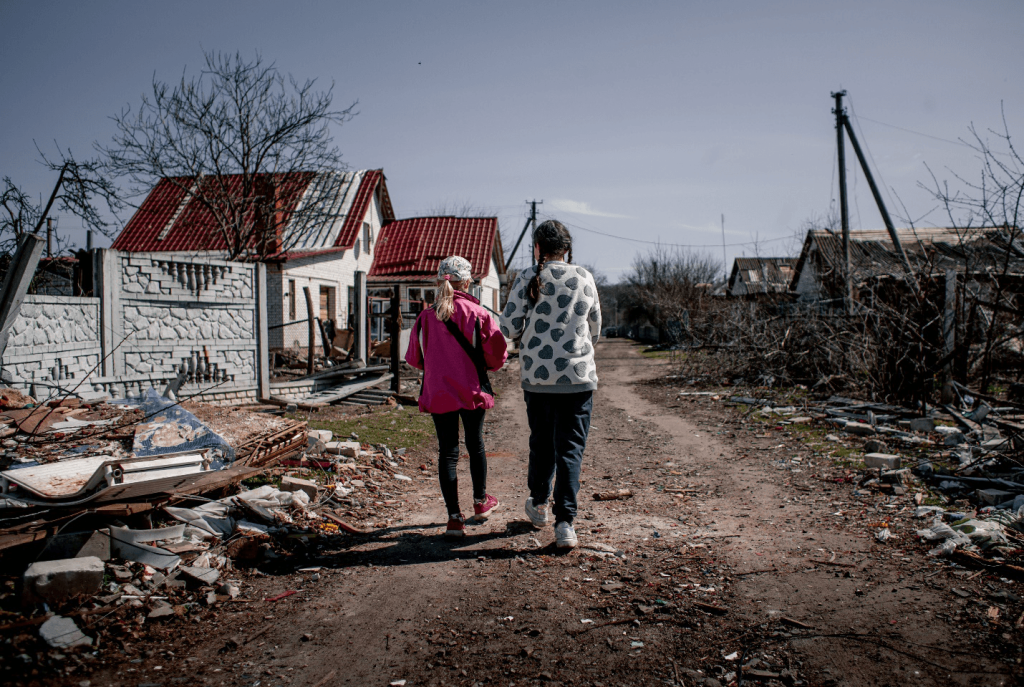 Two Women Walking along