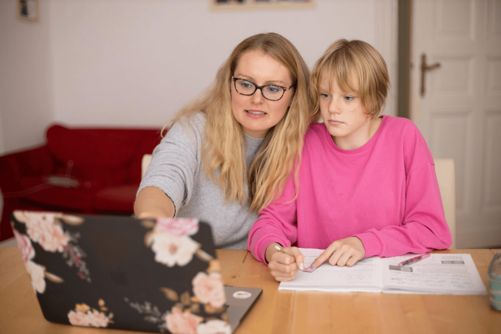 A mother explaining something to her daughter