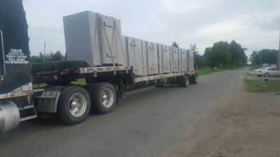 Safe rooms being transported for installation.