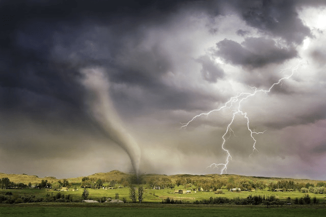Lightning striking the countryside.