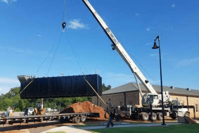 Professionals installing a bunker.