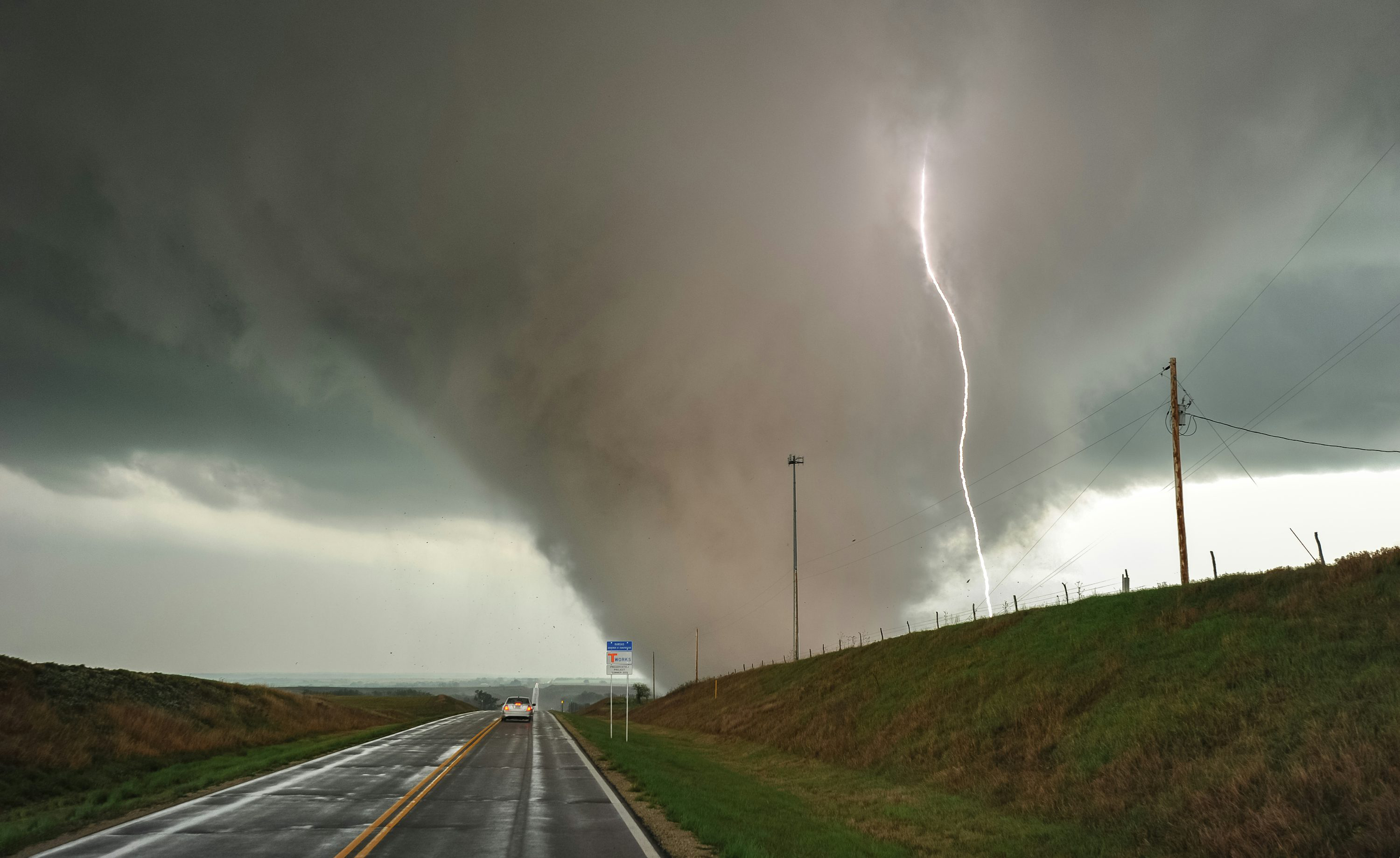 huge tornado near a highway