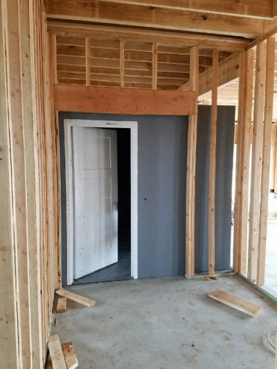Interior view of a residential storm shelter installed during new home construction.