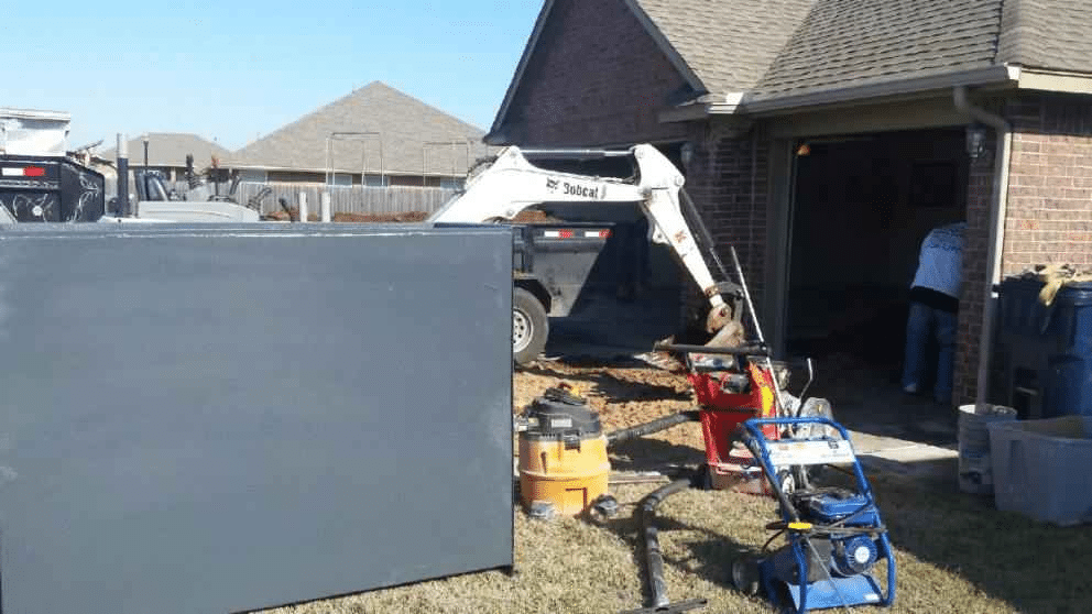 Storm shelter installation in progress.