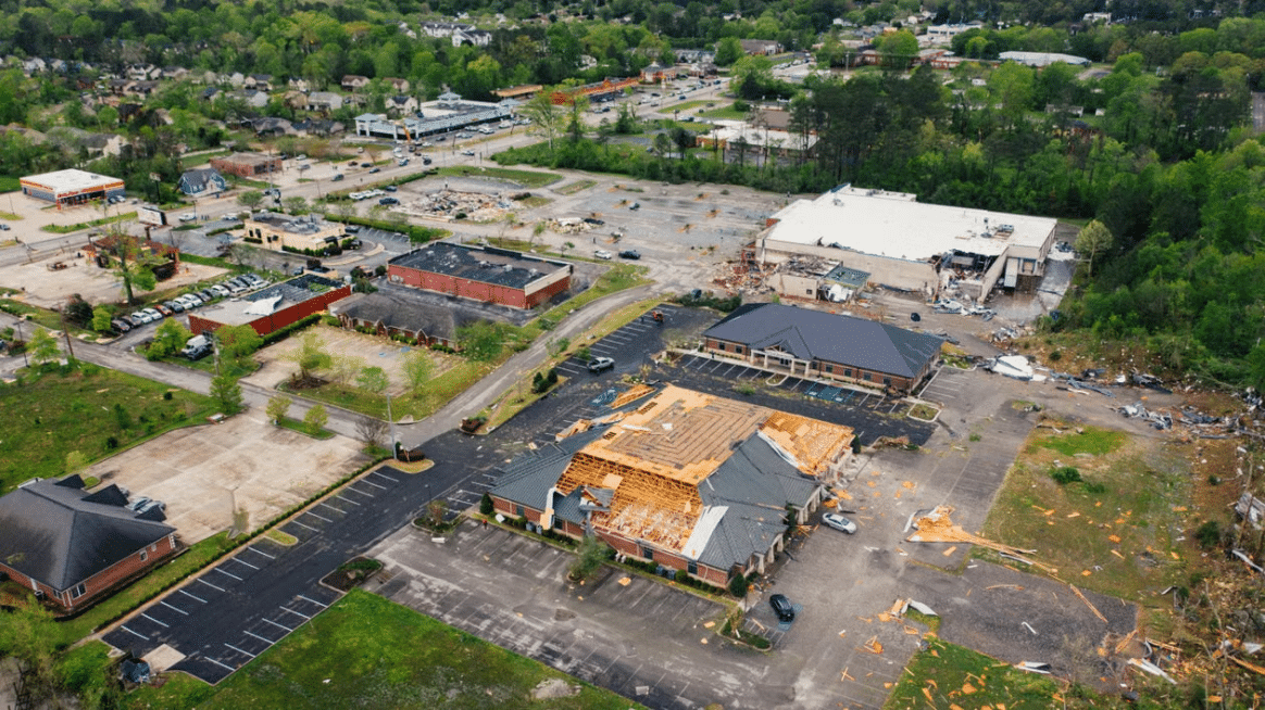 Commercial property damaged by severe weather, highlighting the need for commercial financing options for storm shelters.