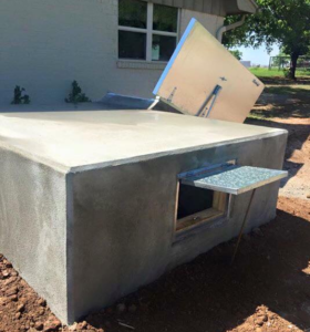 A custom-made concrete storm shelter