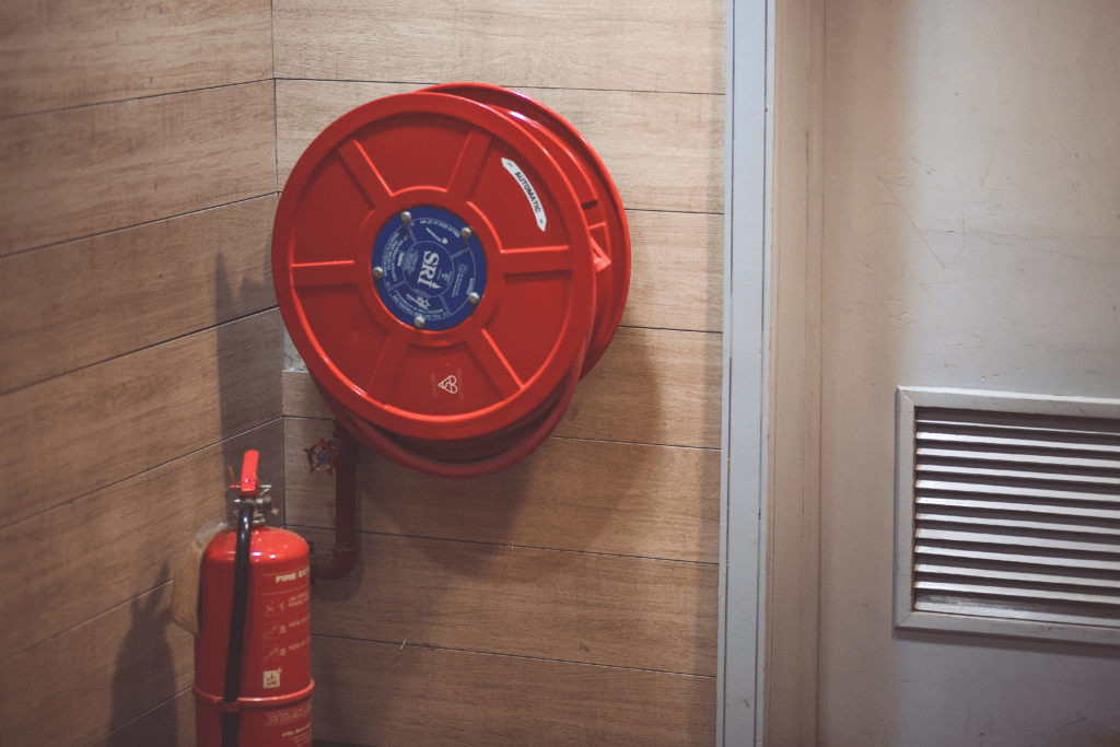 Fire extinguisher and a hose reel