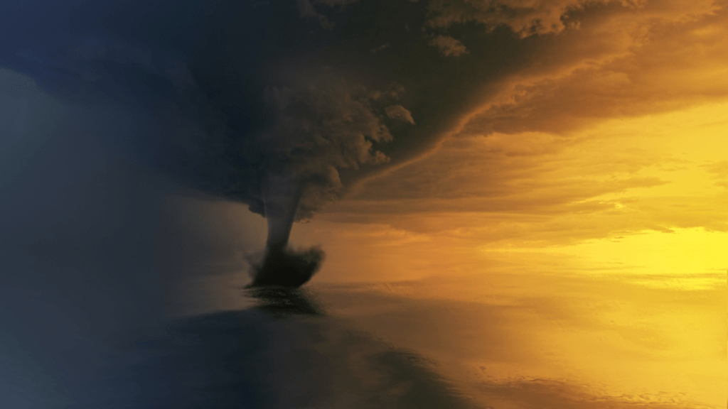 A tornado forming during the golden hour