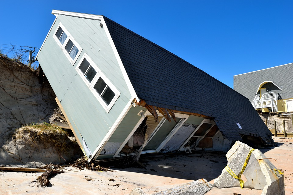 A house tipped sideways due to a natural disaster