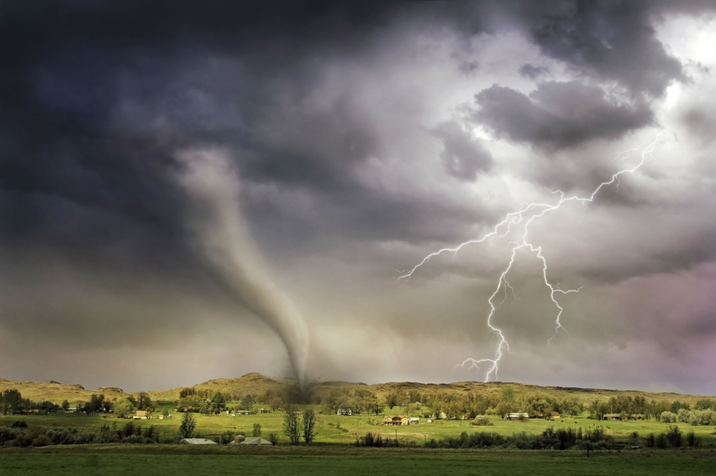 Tornado in an open field