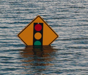 A signboard for traffic lights floating on water